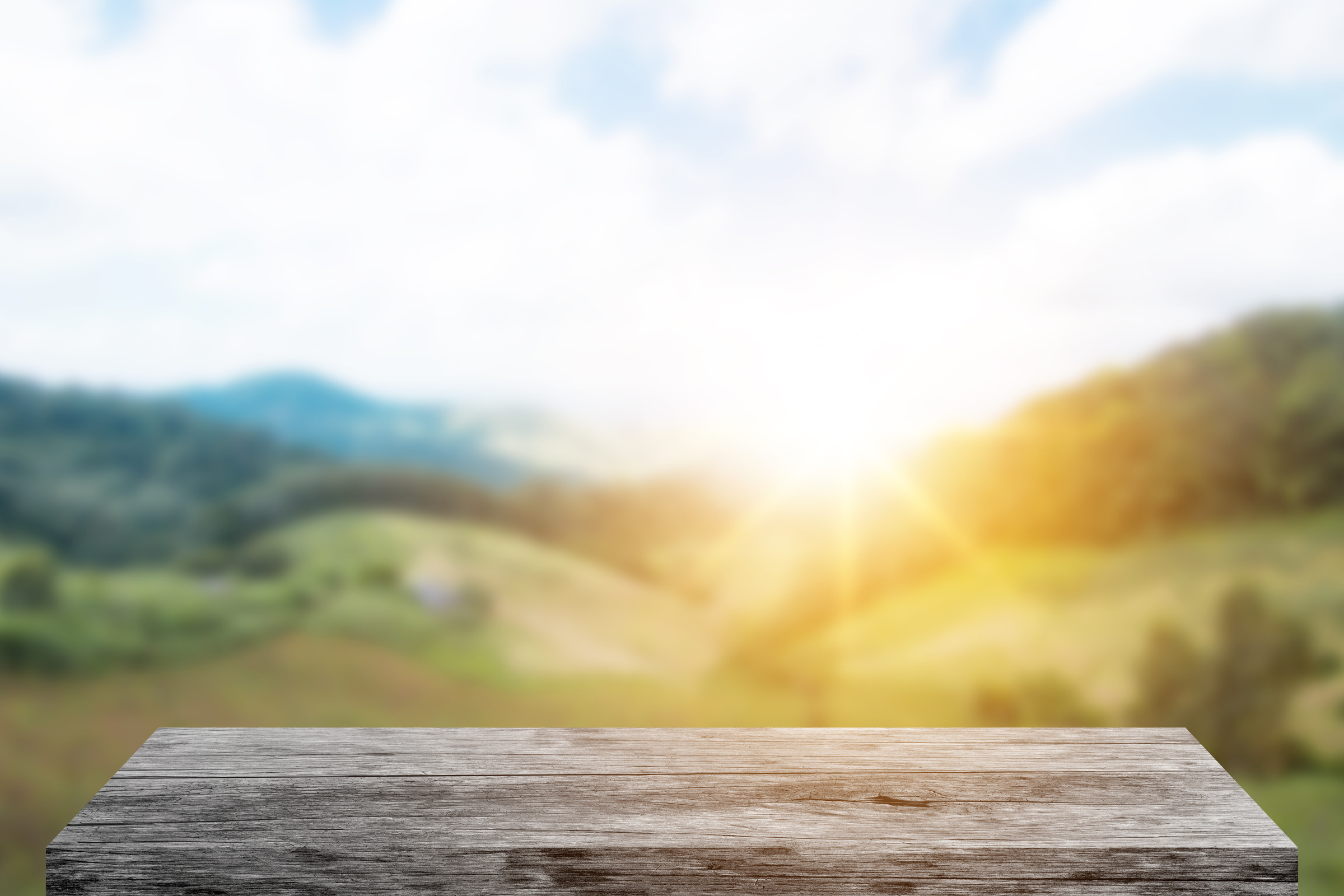 wood table on green nature background